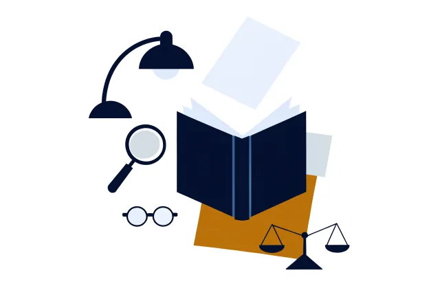 Open law book with a magnifying glass, reading glasses, a small balance scale and a desk lamp.