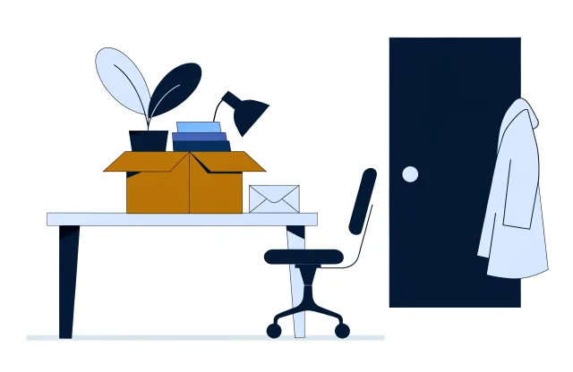Desk with a box of belongings, plants, a lamp and an envelope beside a door with a coat.
