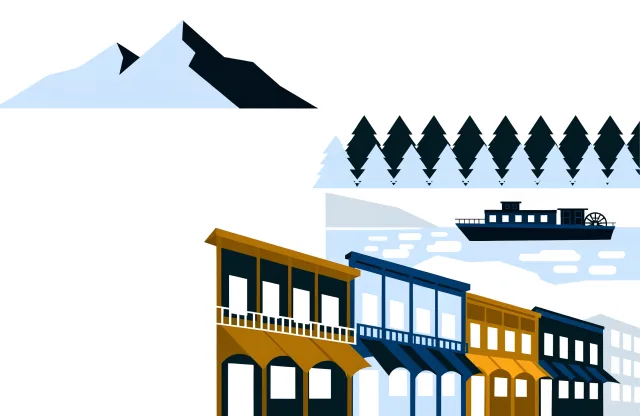 Gold-rush storefronts on a Dawson City street with a sternwheeler on the Yukon River.
